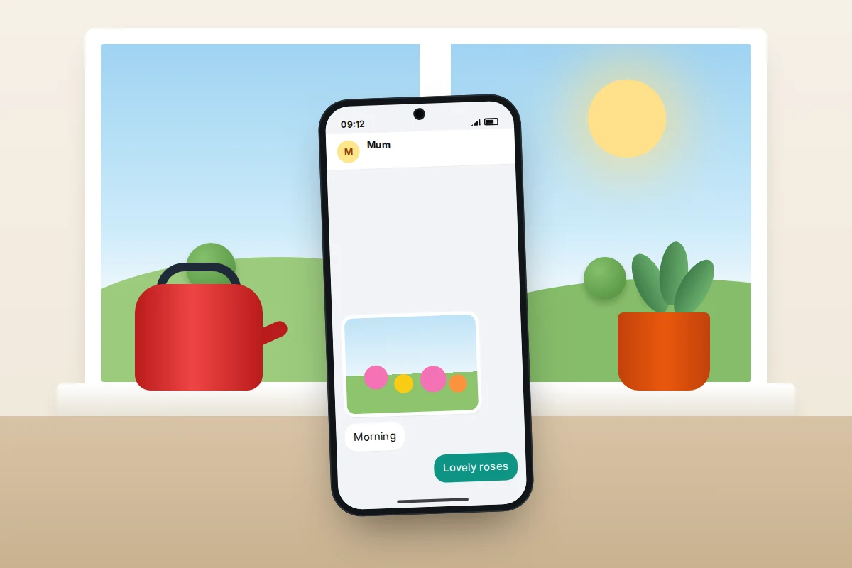 Sunny kitchen windowsill with a kettle, a plant and a phone showing a morning message with a photo of flowers and a reply