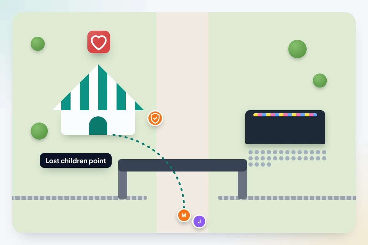 Festival map close-up with a welfare tent marked by a heart icon near the entrance gate and a family walking to it