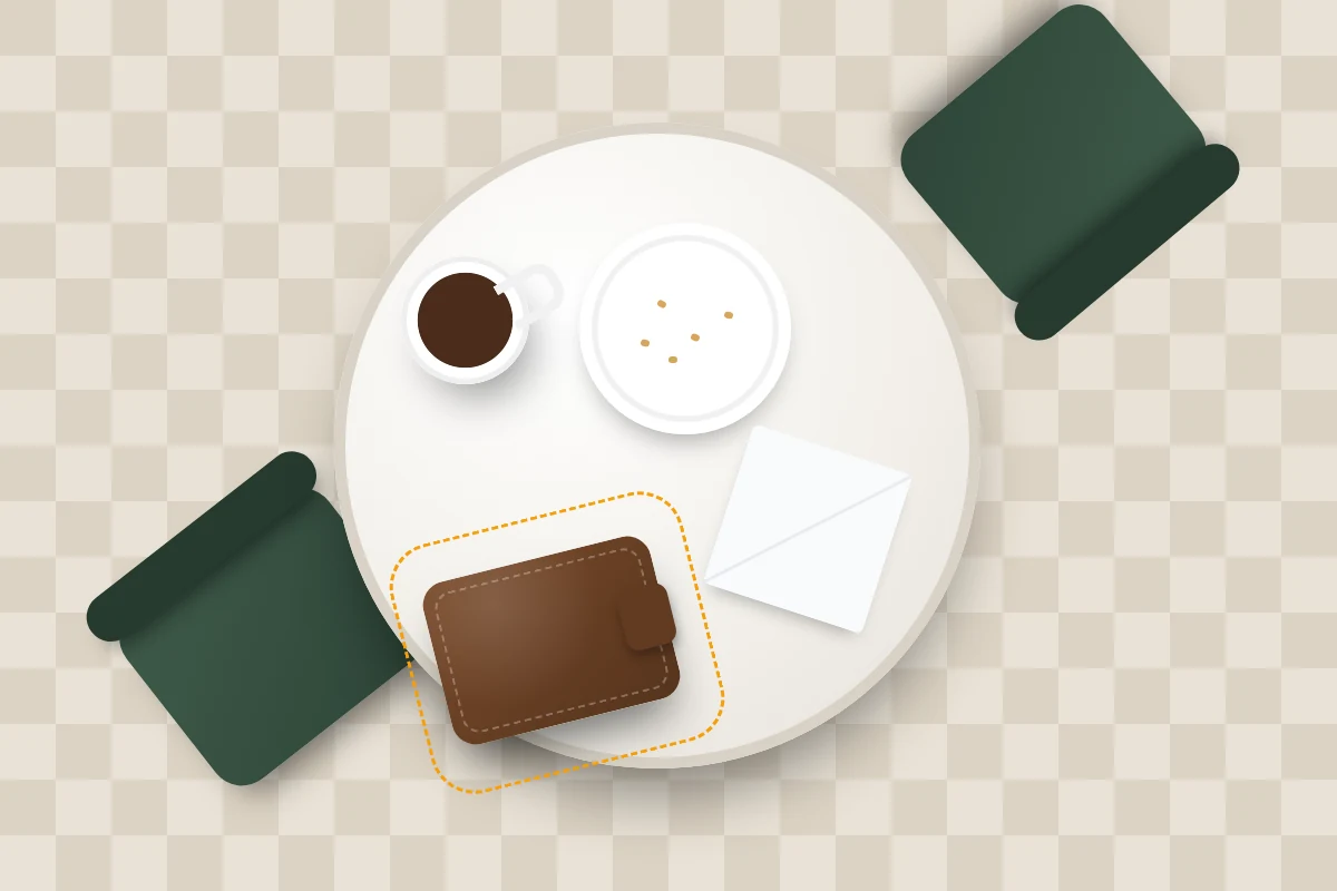 A café table from above with a coffee cup, an empty plate, a napkin and a wallet left near the edge between two chairs