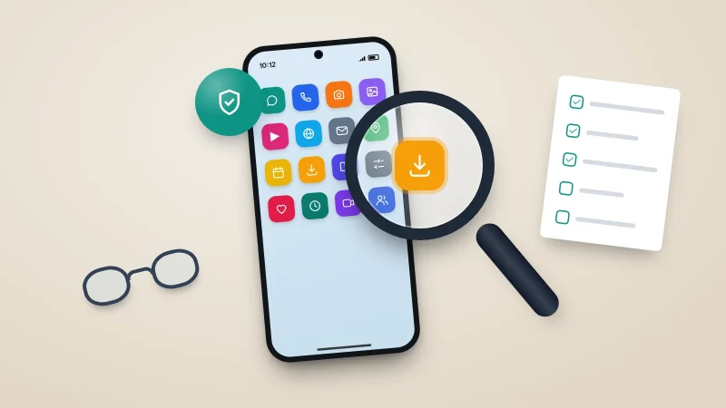 A phone showing a home screen of app icons, with a magnifying glass over one app and a shield badge beside it