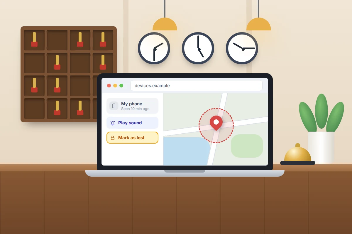 A hotel reception desk with room keys, time-zone clocks, a bell and a laptop showing a device map and a Mark as lost button