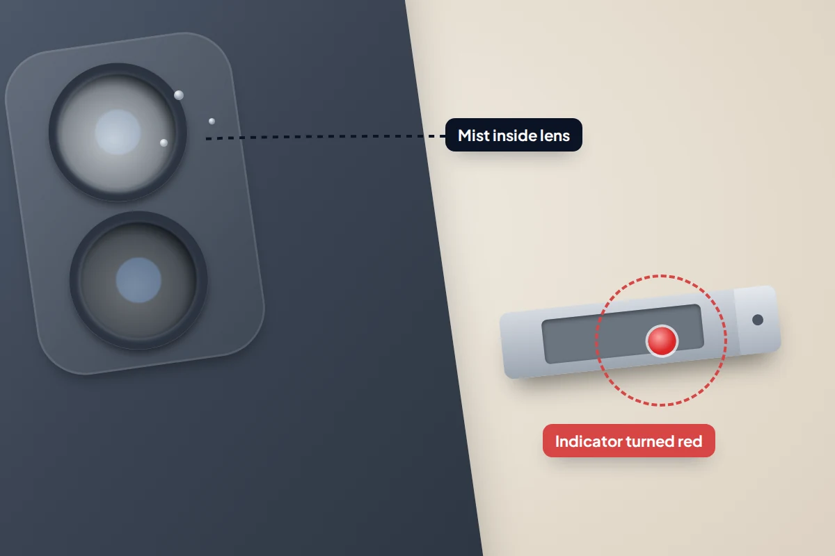 Close-up of a phone's camera with a misted lens, beside a SIM tray with a liquid indicator turned red