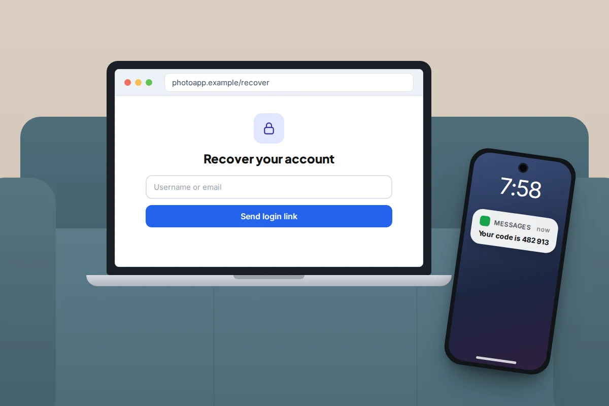 Laptop on a sofa showing a recovery page asking for a username, with a phone beside it displaying a six-digit code