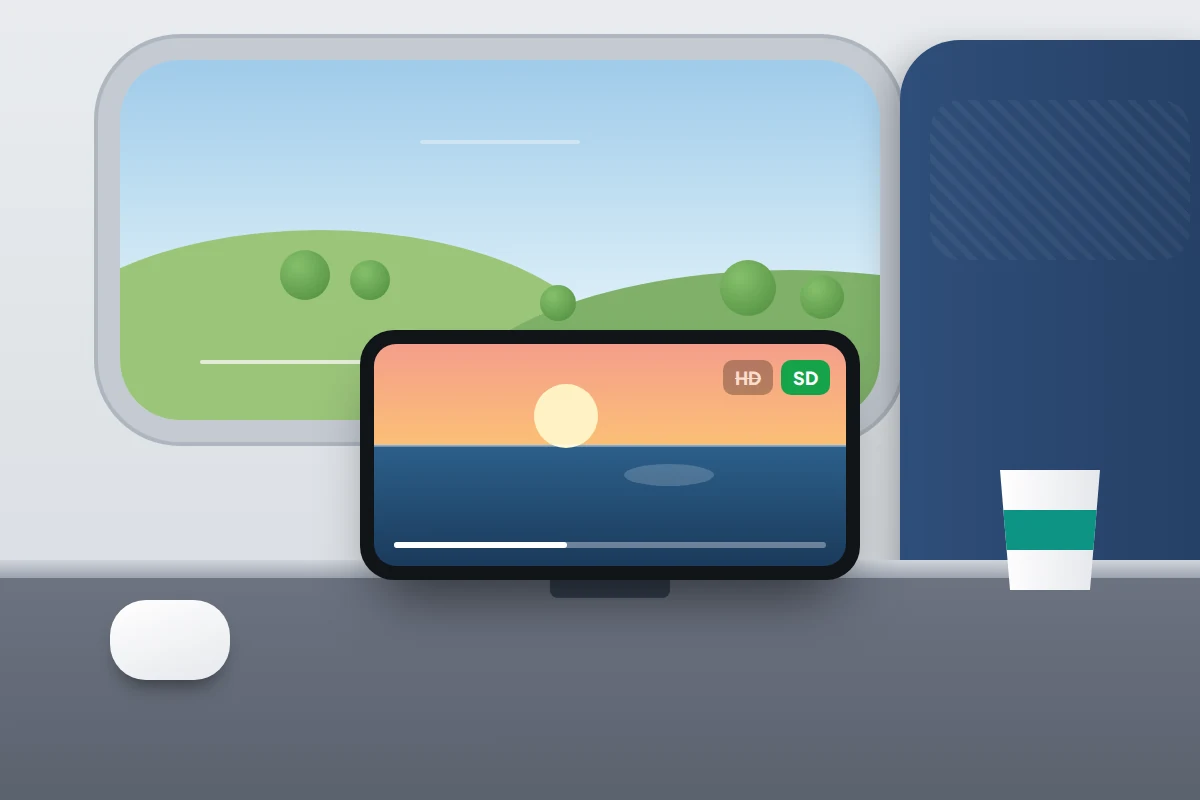 A phone streaming a video on a train table by the window, with the quality badge switched from HD to SD