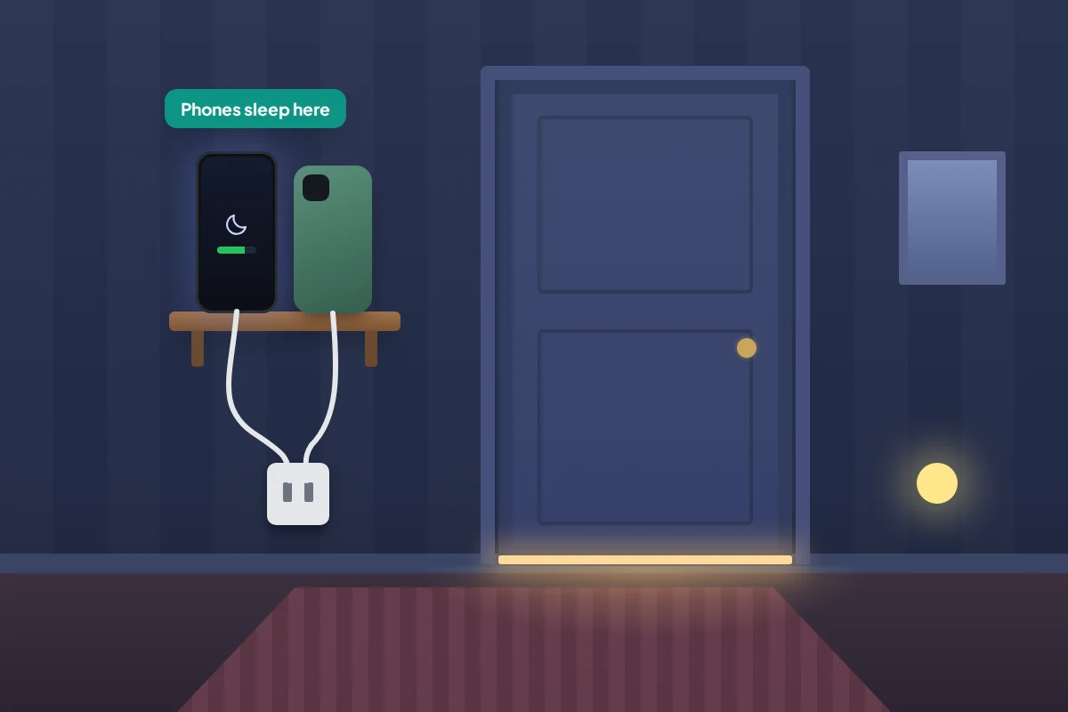 Dark landing at night with two phones charging on a small shelf outside a child's closed bedroom door