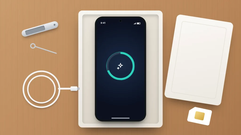 A phone lying in an open box showing an erase progress ring, with a SIM tray, SIM tool, SIM card and charging cable on a wooden table